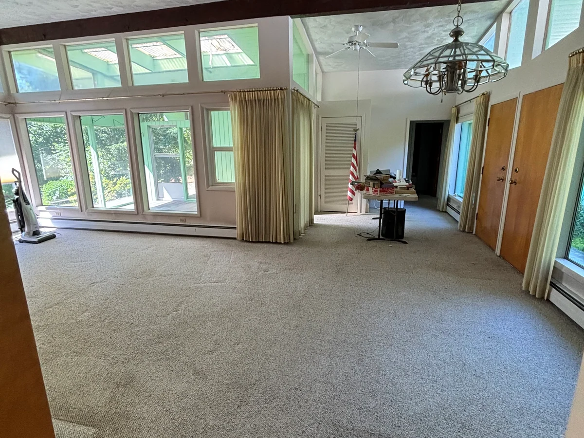 Living room cleared after a real Flying Flamingo furniture-removal job