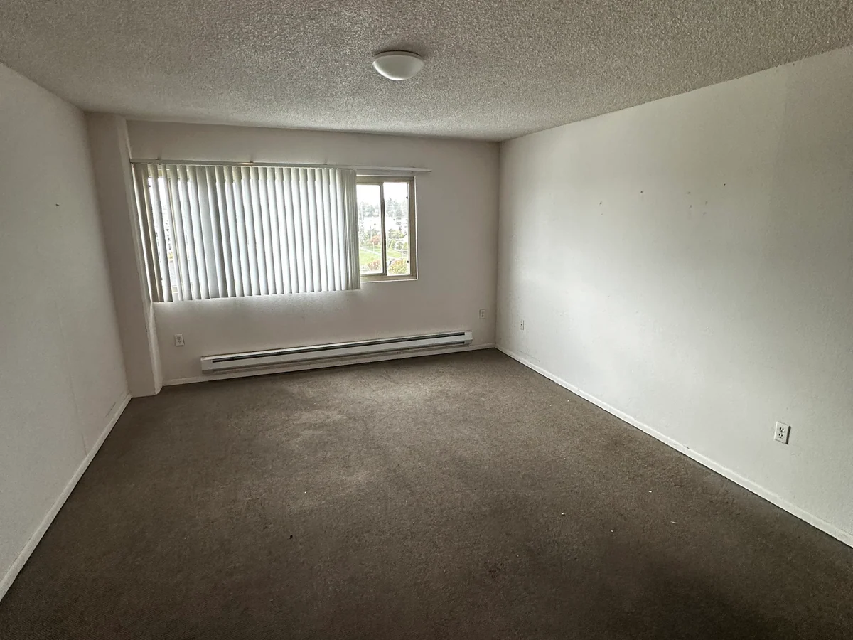 Retirement-community room with an open floor after a real Flying Flamingo cleanout