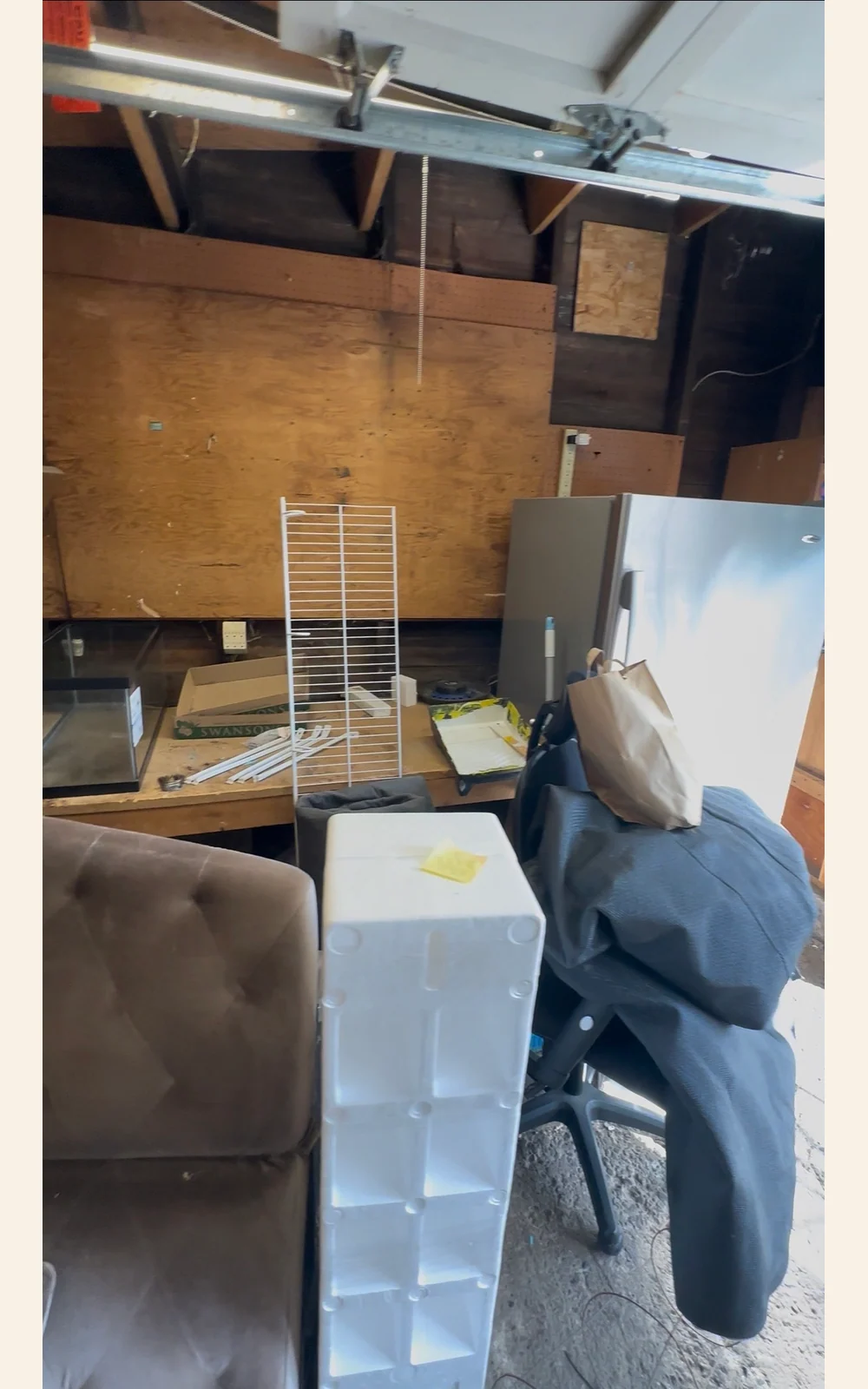 Another view of furniture and stored contents in the same garage