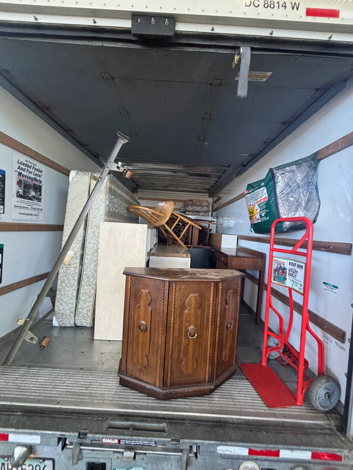 Living room furniture loaded into a removal truck