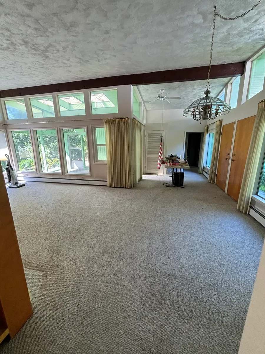 Living room cleared after a real Flying Flamingo furniture-removal job